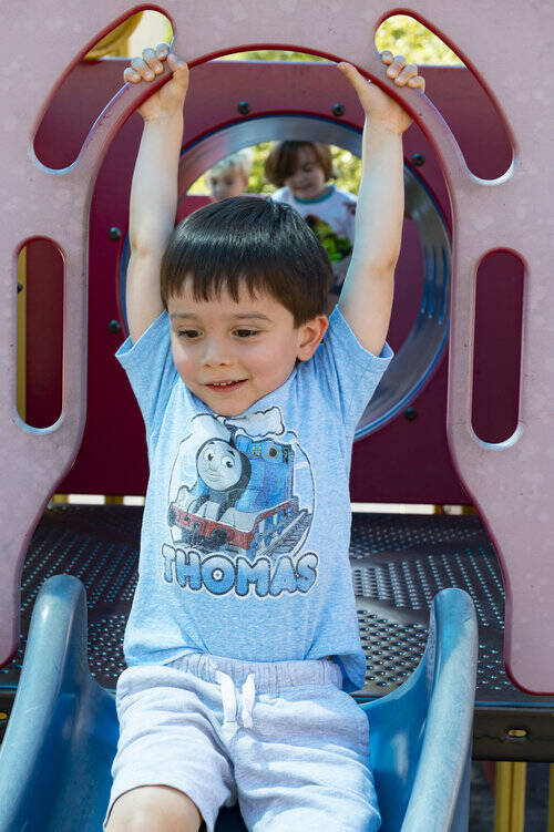 kid-having-fun-on-slide